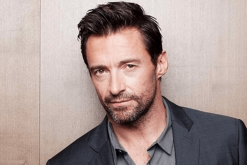 Hugh Jackman reveals his new mullet hairstyle on the set of his new sci-fi  film Chappie in South Africa | Daily Mail Online